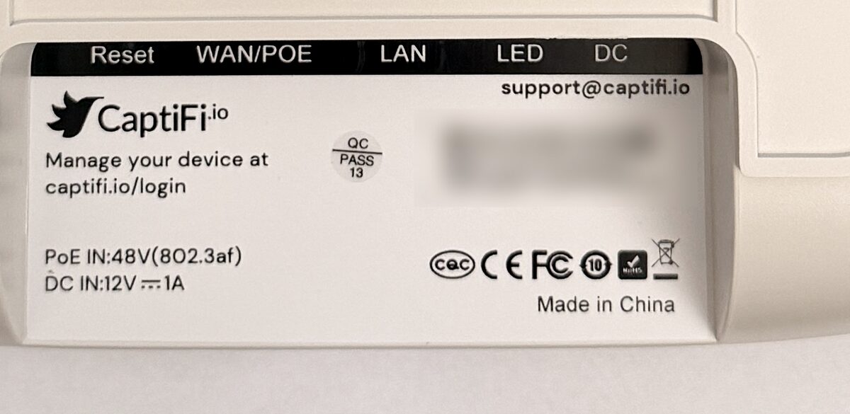 The label on the underside of the CaptiFi device, showing the Reset, WAN/POE, LAN, LED and DC sockets